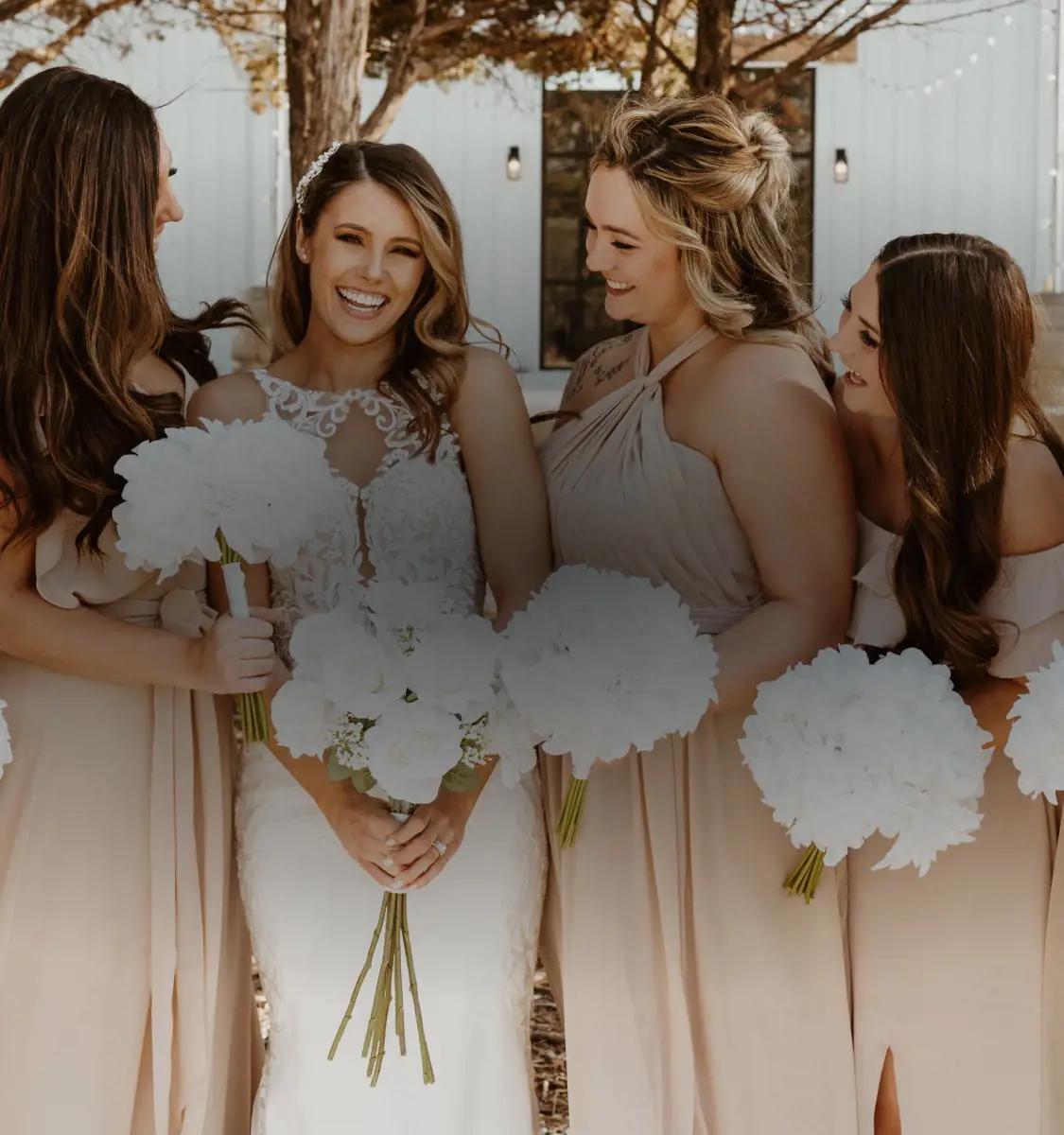 Models wearing a bridesmaids dresses. Mobile image